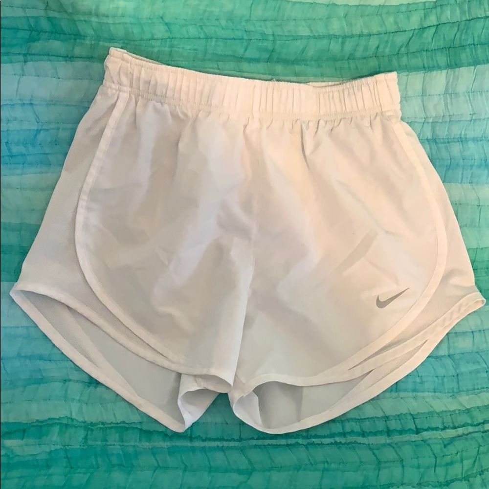 All white Nike dri fit running shorts